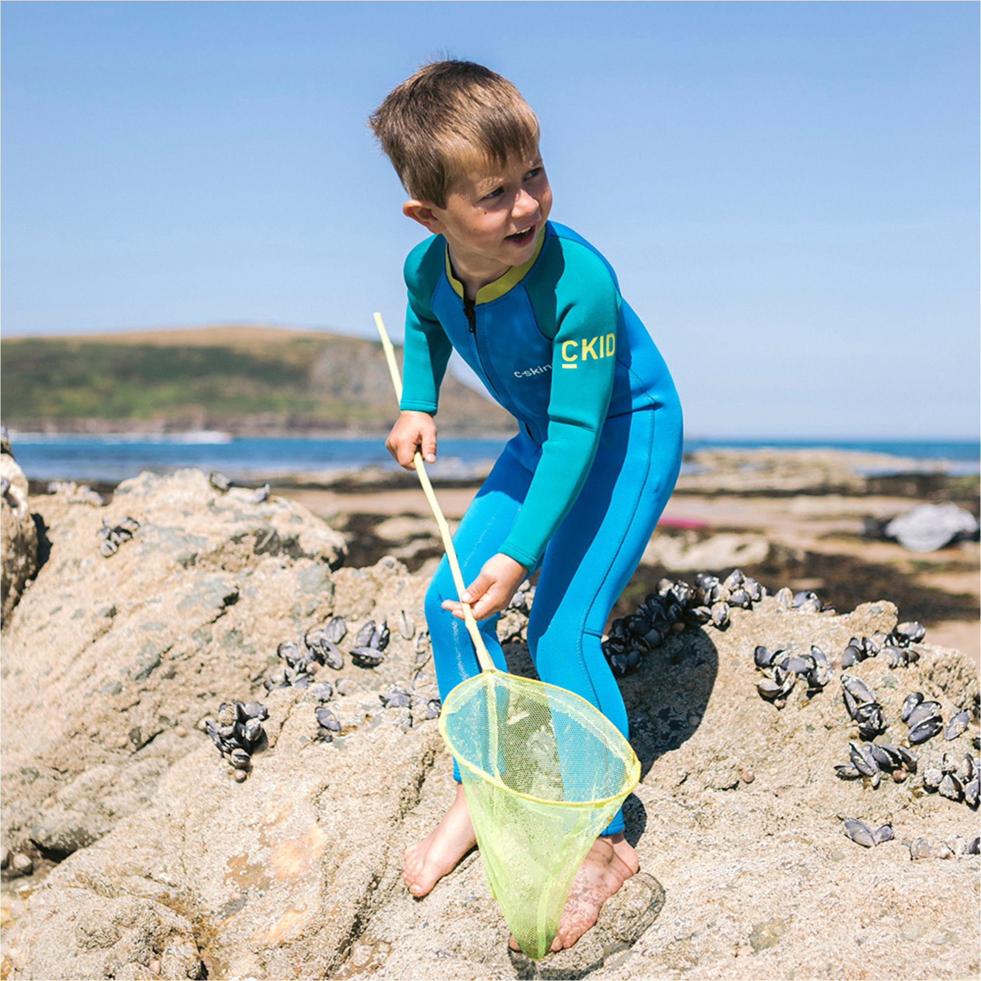 2025 C-Skins Junior C-KID 3/2mm Front Zip Wetsuit C-BA32ST - Cyan / Green / Aurora Yellow